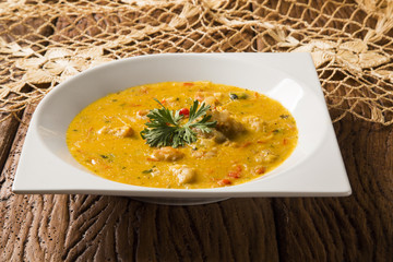 shrimp bobo - a Brazilian dish of shrimp in a pure of manioc meal and coconut milk. Bobo de camarao.