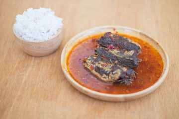 Fried mackerel in chilli sauce eating with rice