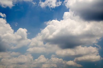Fototapeta na wymiar Blue sky with white cloud and partial dark clouds. Sky cloud. 