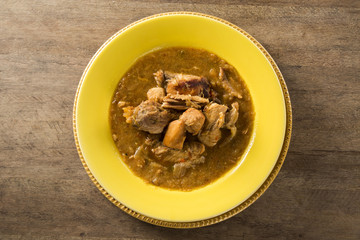 Fish pirão with pieces of chicken from angola