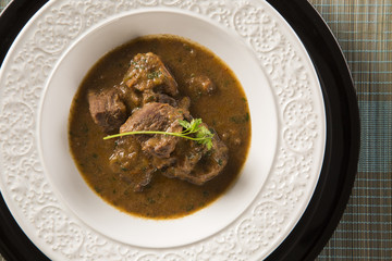 Rustic Stew meat with sauce in the white plate