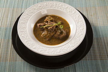 Rustic Stew meat with sauce in the white plate