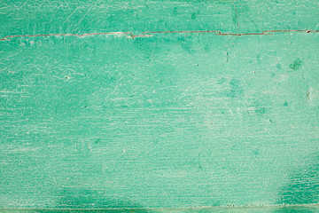 Fototapeta na wymiar Old painted green wood board