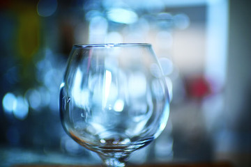 Glasses standing on a shelf