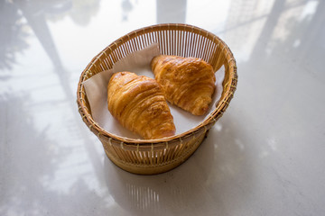 Croissant in a basket
