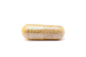 Natural medicine capsules isolated on a white background