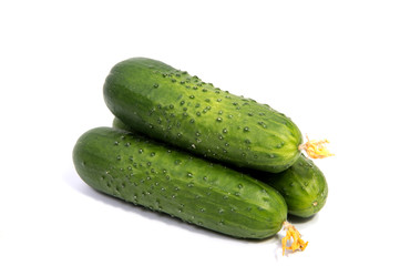 Cucumbers on a white background. In this photo we see a fresh cucumber on a white background.