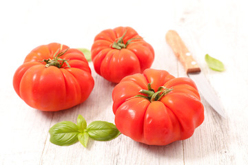 red tomato with basil