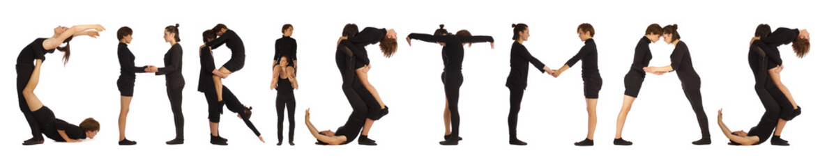 Black dressed people forming word CHRISTMAS