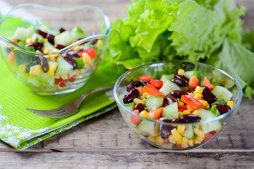 Vegetable salad with sweet pepper, cucumbers and haricot