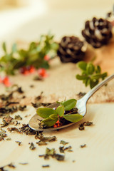berry tea on wooden table, closeup