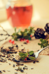 berry tea on wooden table, closeup