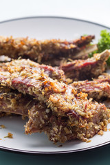 Lamb ribs on plate
