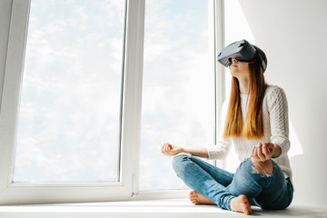 Young Woman with glasses of virtual reality. Future technology concept. Modern imaging technology.