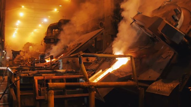 department of Metallurgical plant, smoke of Red-hot metal is going up from blast furnace