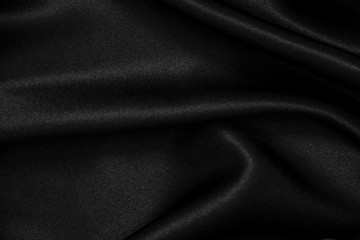 Naklejka na ściany i meble Black silk fabric background