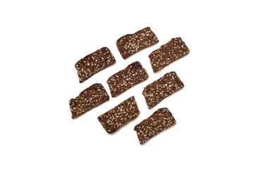 Black bread with seeds on white background
