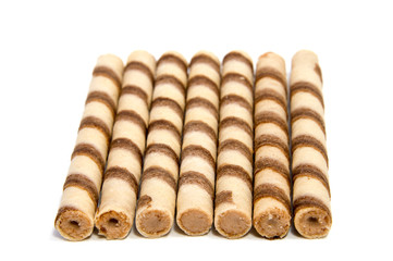 wafer rolls with chocolate isolated on white background