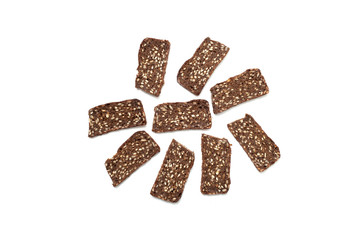 Black bread with seeds on white background
