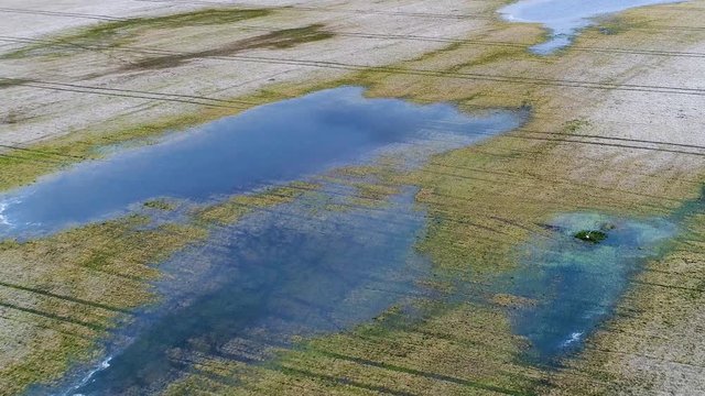 aerial view of flooded fields and lakes at spring