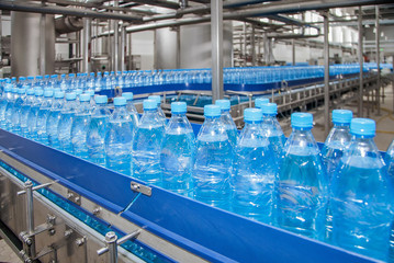 conveyor for bottling water from plastic bottles