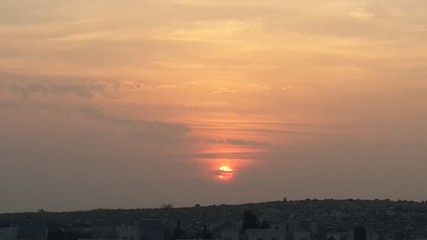 A red sunset through the clouds