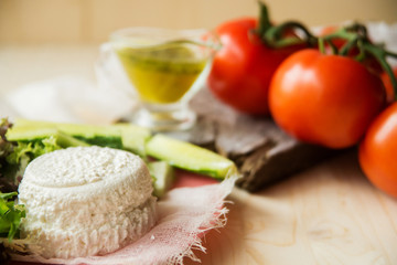 Plate of Healthy Classic Caprese Salad with Mozzarella Cheese, Tomatoes and Basil