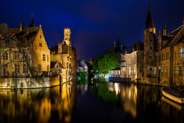 Night view of famous Bruges city view, Belgium, nightshot of Brugge canals, houses on Belfry canal