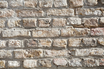 Naklejka premium Detailed white brick background. Wall of red damaged blocks. Dirty stone pattern