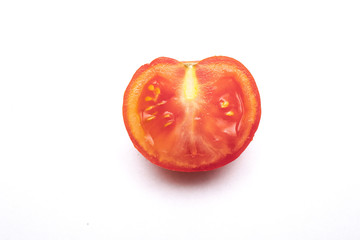 Cut tomato on a white background
