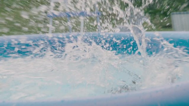 Girl Jumping and diving in Swimming Pool Slow Motion-
Perfect for videos about: swimming, pools, summer fun, vacation, getaways, underwater footage, kids, beating the heat, and exercise.