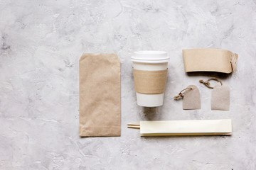 paper bags and plastic cup for take away set top view space for text
