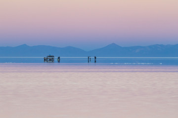 Sunrise reflection in the Salar de Uyuni, Potosi Department, Bolivia