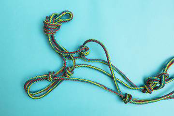 A rope of rope with knots on a blue background.