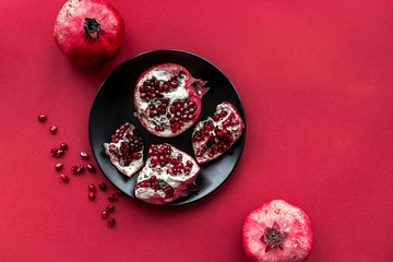 Ripe fresh fruit on red background top view space for text