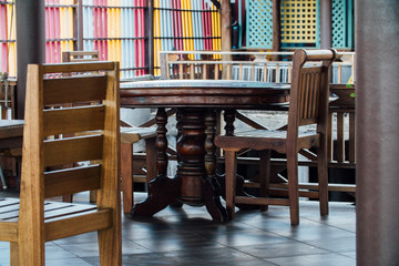 Empty coffee terrace with tables and chairs in Asia.