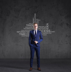 Businessman standing over wall with text. Business, success, improvement, concept.