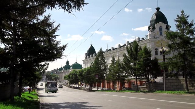 Panorama along the street of Lenin. Summer day. Historical Buildings. Green trees. Street without ads