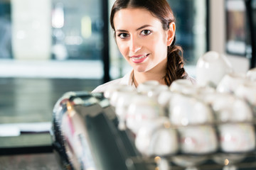 Young woman working in a commercial kitchen