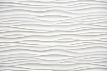 Fototapeta na wymiar Beautiful white wall in the form of waves