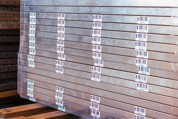 Shelves are numbered from the iron rack on the address of the warehouse. shallow depth of field