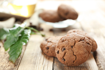 Closeup of delicious coffee cookies on wooden table