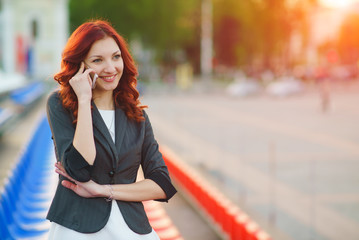 Girl in the city talking on the phone