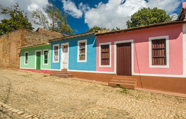  Colorful houses on the cobblestone streets in the UNESCO World Heritage city center of Trinidad Cuba.