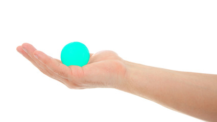 Male hand with stress ball on white background