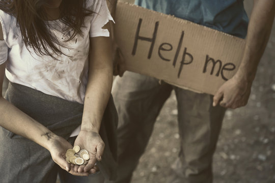 Poor people begging for help on the street