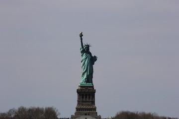 Statue of Liberty against blue sky