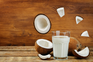 Coconut milk with coconuts and flying slices