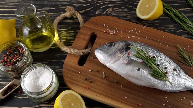 Fresh raw dorado and on table