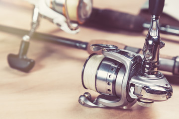 Fishing rods and reels with line. Close up and selective focus